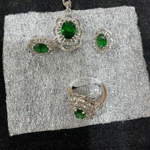 Man made eneralds around simulated diamonds set of ring earrings and neclace!